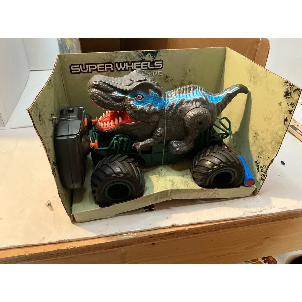 Super Wheels RC Dinosaur Monster Truck Light Sound Mist Spray Blue T-Rex Toy NWT